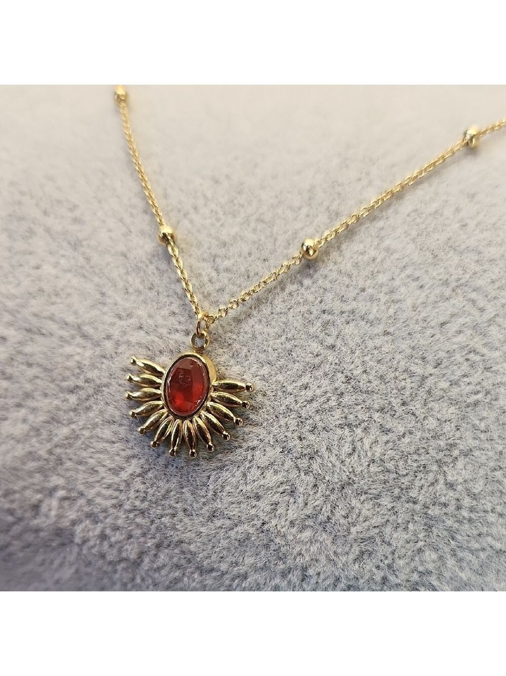 18k Gold Plated Stainless Steel Radiant Necklace with Red Sunburst Pendant